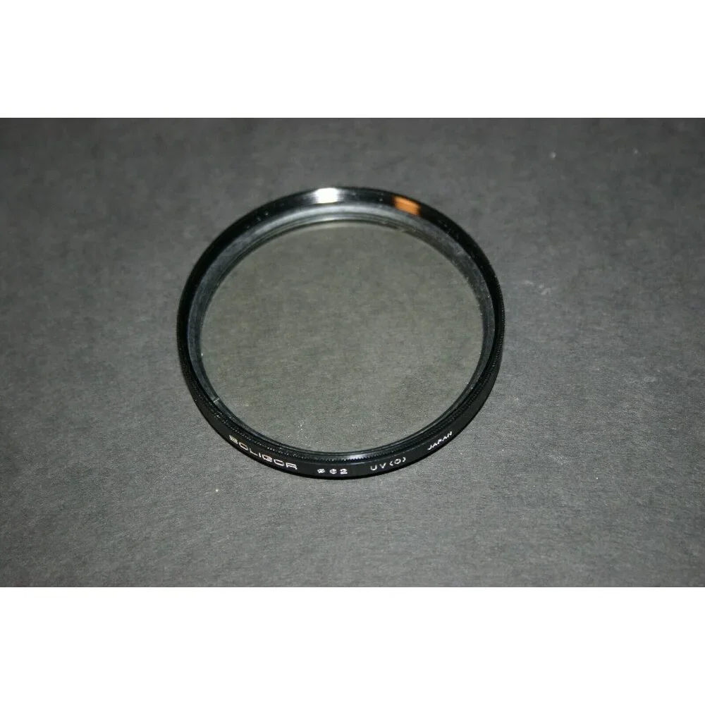 camera lens filters Soligor 62mm uv, Tiffen 49mm 80B, Osawa 58mm strap LOT (3)